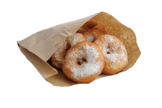 Fried donuts in a paper bag on white background (isolated)