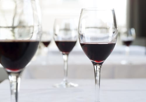 Glasses with red wine on a table