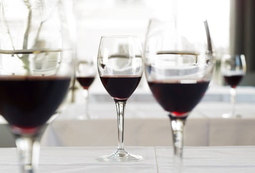 Glasses with red wine on a table