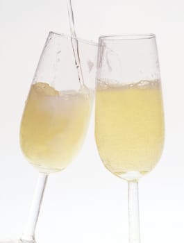 Two Glasses of champagne on white background