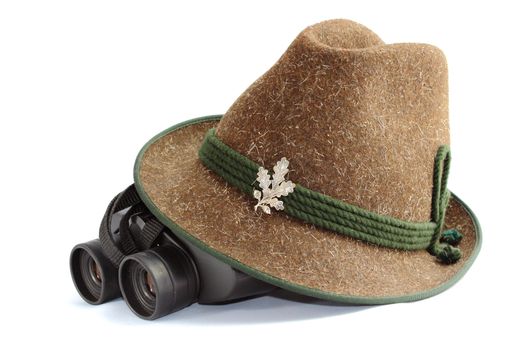 hunting gear - old hunting hat and binoculars