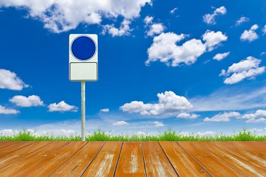 wood way and blue blank sign on blue sky