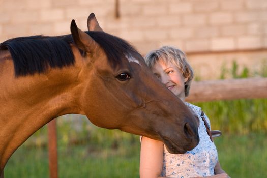 Big Horses head on womans shoulder