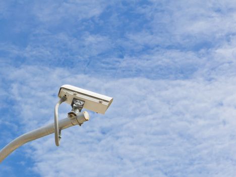 outdoor security cctv camera against blue sky