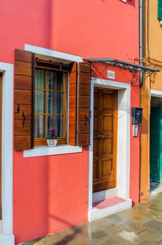 Door and windows colorful houses of Burano, Venice, Italy