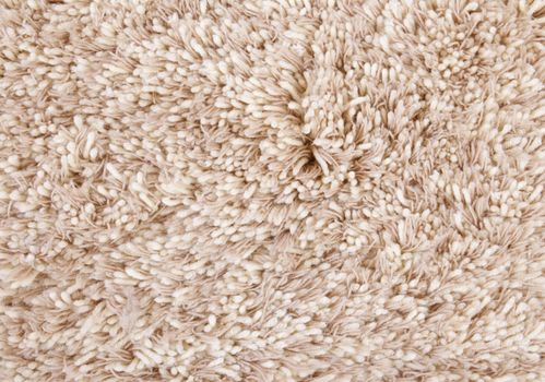 beige carpet texture, frontal view close-up woolen fibers