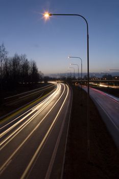 Moving traffic on Highway at dawn