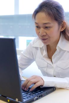 asian woman with laptop notebook