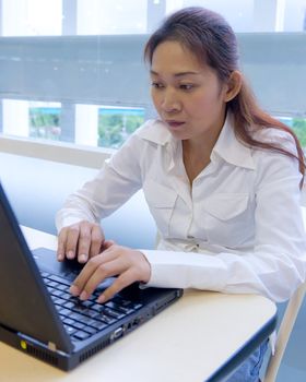 asian woman with laptop notebook