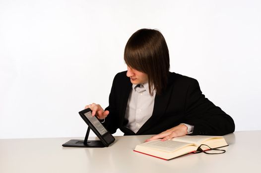 Student chosing between an ebook and a traditional paper one