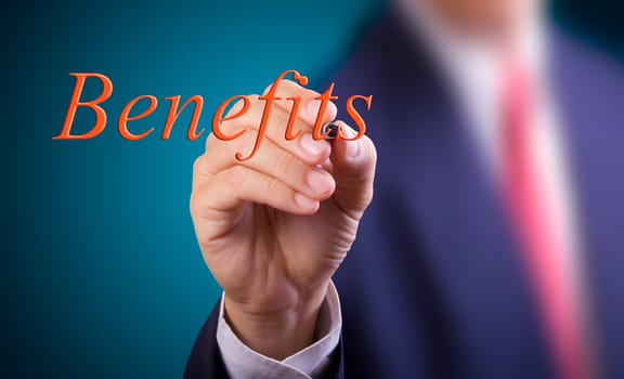 business man writing benefits word