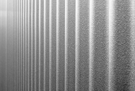 Vulcanized corrugated steel wall that looks like it diminished to infinity