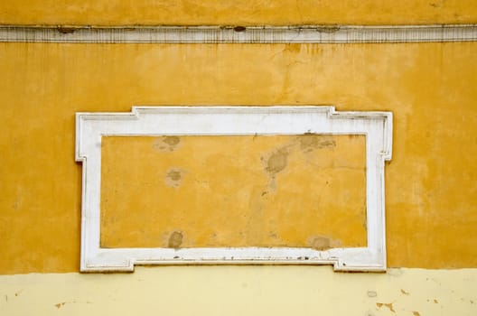 Background of ancient wall architecture. Collapsing retro vintage yellow backdrop.