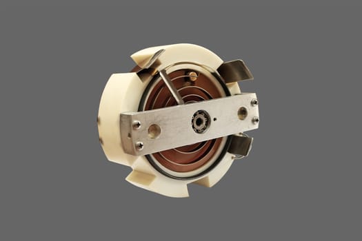 Laboratory potentiometer, close-up, isolated on a gray background.