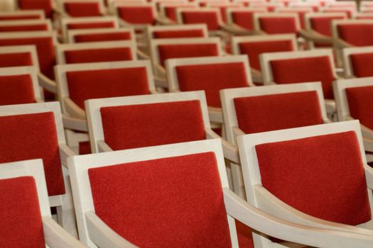 Stock photo: an image of many  red and white armchairs