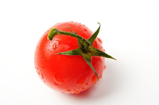 An image of fresh red tomato on white background