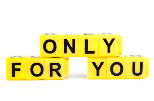 An image of yellow blocks with words ''only for you'' on them