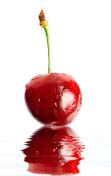 An image of red cherry in a water