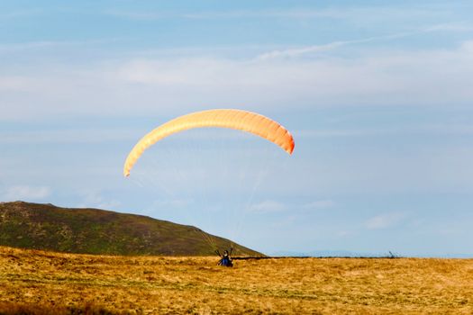An image of a glider on the yellow ground