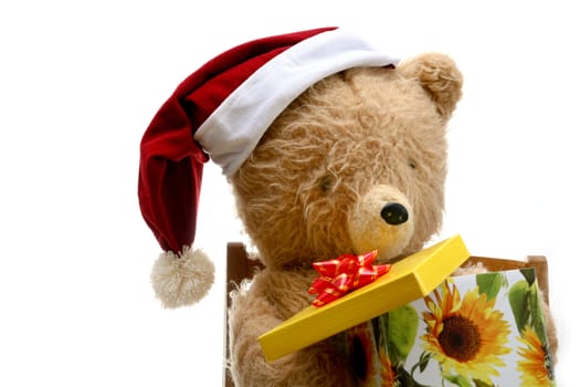 An image of bear toy with gift