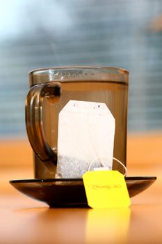 An image of cup of tea on table in a kitchen