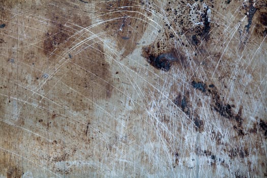 An image of a background of scratched rusty metal