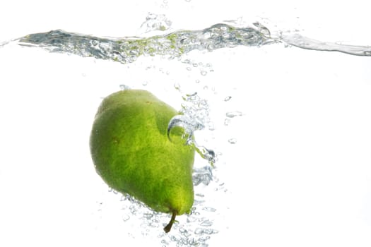 An image of pear falling in water