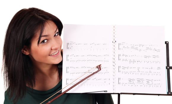 girl and notebook for musical notes