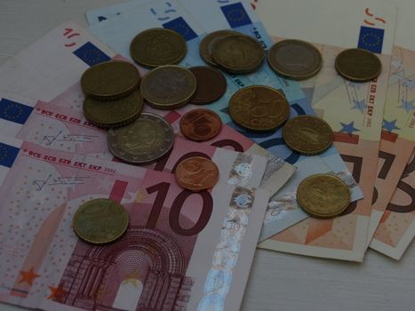 Euro (EUR) banknotes and coins money useful as a background or money concept