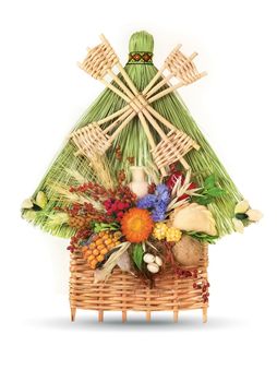 Traditional ukrainian souvenir that made of dried materials and plants. Hand-made. Isolated on white.