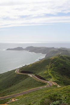 A road on hills by the ocean