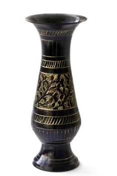 blackened vase from brass ( manual thread on metal) on uniform background