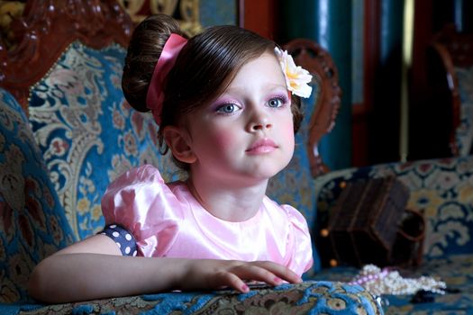 Portrait of girl in pink, close-up