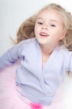 Studio shot of ballet dancer girl in blue