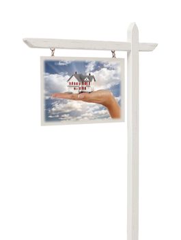 Isolated Real Estate Sign with Clipping Path - Hand Holding House in Front of Clouds, Sky and Sun Rays.