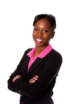 Beautiful happy smiling African business woman in suit and arms crossed, isolated.