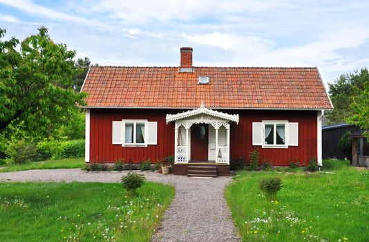 Red cottage. Typical swedish summer house.