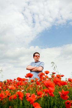 An image of a man in a red field