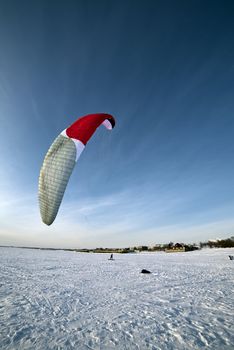 the Ski kiting on a frozen lake