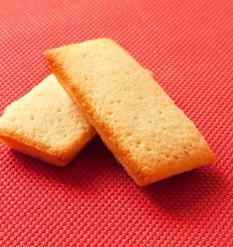 French biscuits called Financiers, with almond powder, smooth inside and crispy on the edges