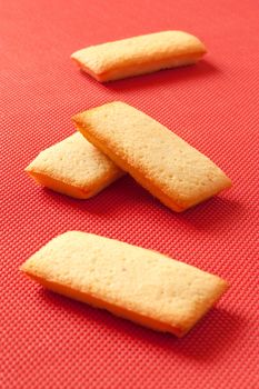 French biscuits called Financiers, with almond powder, smooth inside and crispy on the edges