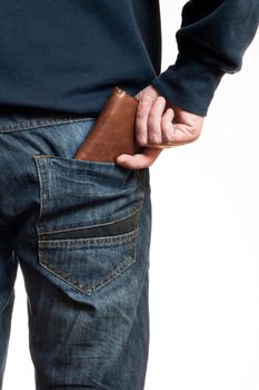 A man taking his wallet in his pocket to illustrate the economy, consumption, financial crisis