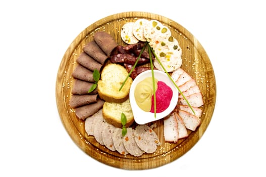 wooden plate with sausage on a white background