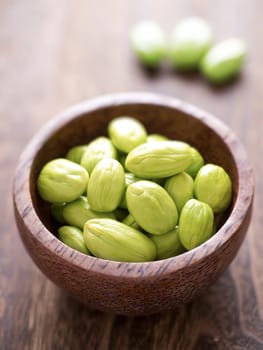 close up of  bowl of petai beans