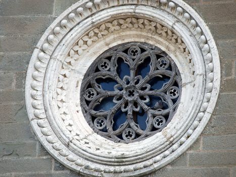 Rose window on the facade of the church of St. Margaret of Cortona