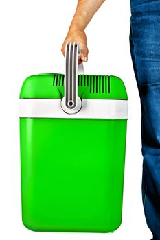 Green a small portable cooler for travel in the hands of a man isolated on white background