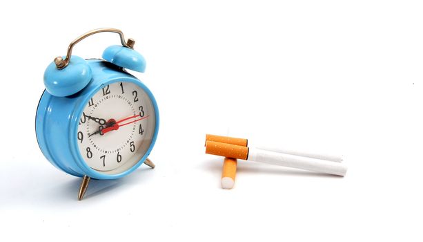 pic of cigarette and clock