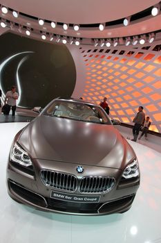 GENEVA - MARCH 16 : Brown BMW Gran Coupe 6 series on display at the 82st International Motor Show Palexpo -Geneva on March 16; 2012 in Geneva, Switzerland.