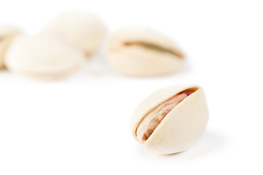 Macro view of pistachio over white background