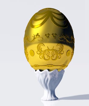 Large gold and decorated easter egg on white ceramic vase on white background